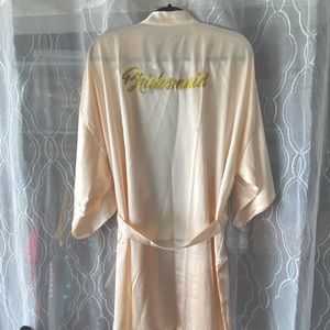 Silk David’s Bridal Bridesmaid robe. Size 2X-3X, pearl pink. Never worn.